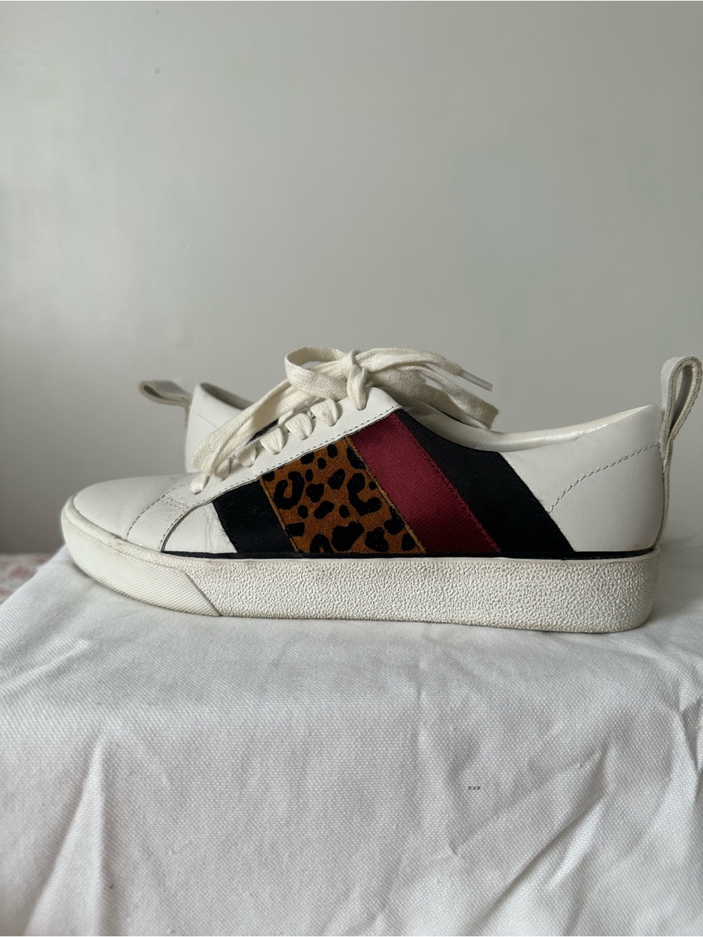 DVF white sneakers with leopard print, black, and burgundy stripes size 7